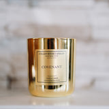 Gold candle with 'Cullen House Candles' label on a marble surface