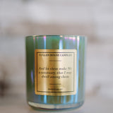 Candle with a label on a blurred background