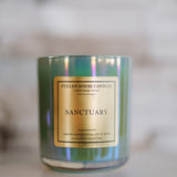 Candle with a gold label on a blurred background