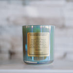 Candle with a label on a marble surface