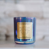 Candle with a label on a marble surface
